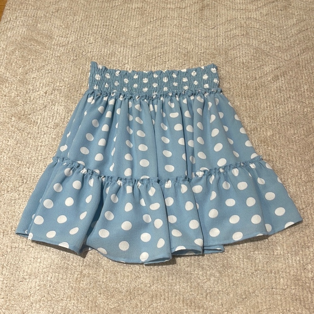 Size medium Altar’d State mini skirt. Light blue with polka dots.